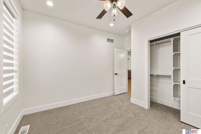 unfurnished bedroom with recessed lighting, visible vents, light carpet, and baseboards