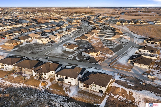 birds eye view of property with a residential view