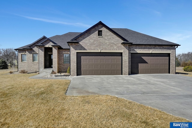 french country home featuring concrete driveway, brick siding, a front lawn, and roof with shingles