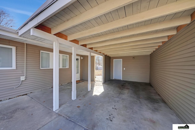 view of patio / terrace featuring a carport