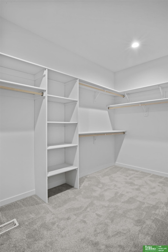 walk in closet with carpet and visible vents