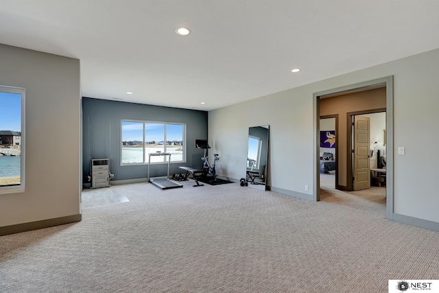 workout room with baseboards, carpet flooring, and recessed lighting