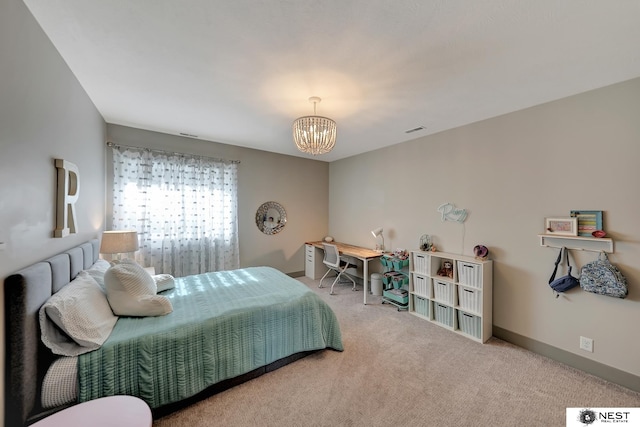 bedroom with a chandelier, carpet flooring, visible vents, and baseboards