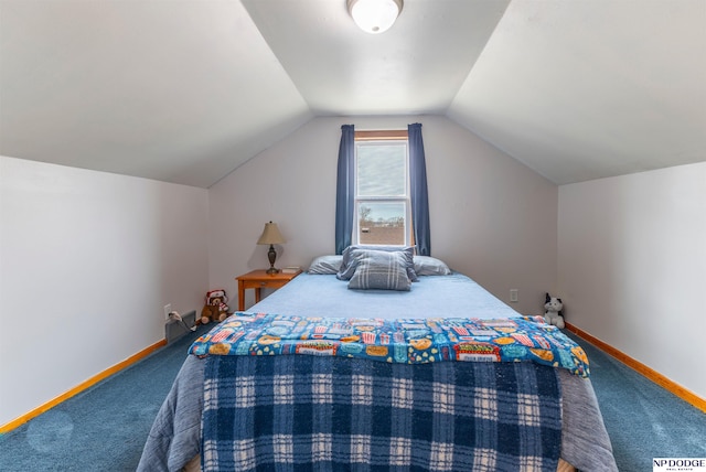 carpeted bedroom with lofted ceiling and baseboards