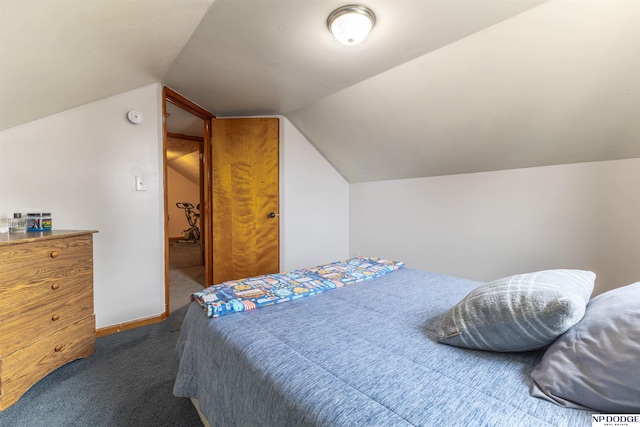 bedroom featuring carpet floors, baseboards, and lofted ceiling