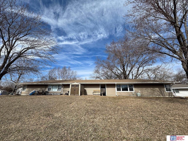 3324 Gott Cir, Lincoln, NE 68524 - view of front facade with brick siding and a front lawn