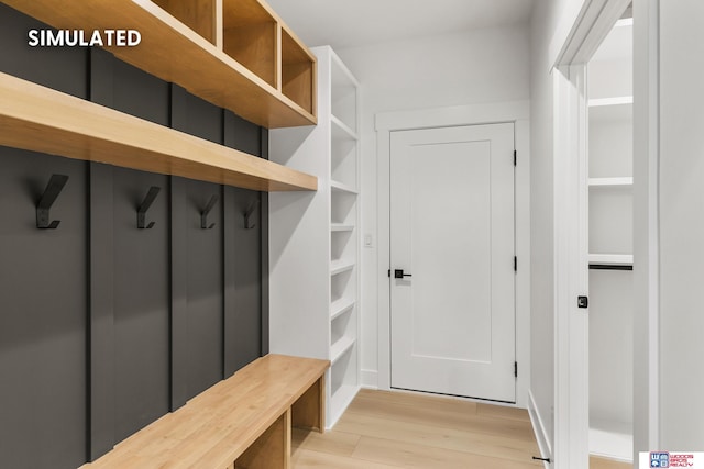 mudroom featuring light wood-style floors