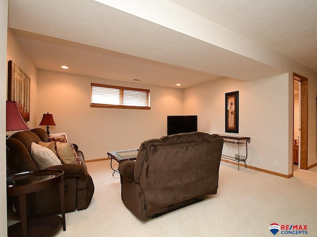 living area with carpet floors, baseboards, and recessed lighting