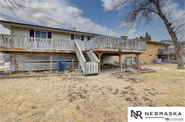 back of house with stairs, fence, a wooden deck, and central air condition unit