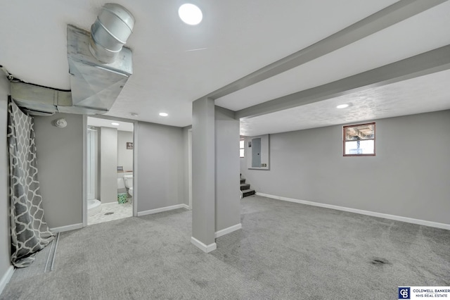 basement featuring electric panel, baseboards, stairway, carpet, and recessed lighting