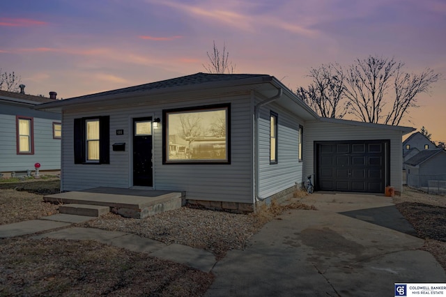 view of front facade with a garage and driveway