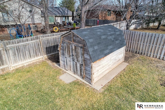 view of shed with a fenced backyard