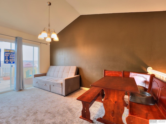 interior space featuring vaulted ceiling, carpet flooring, and a chandelier