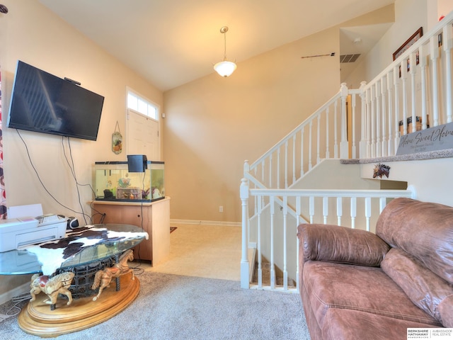 living area with baseboards, stairs, visible vents, and carpet flooring