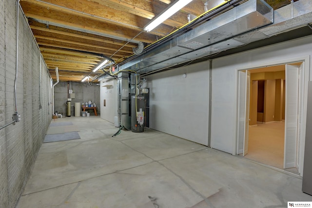 unfinished basement with water heater