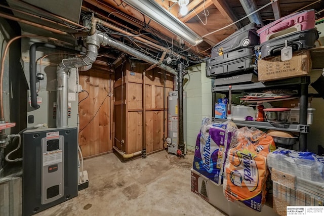 unfinished basement with heating unit and water heater