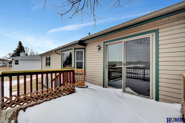 view of snow covered deck