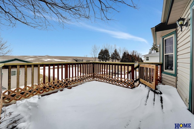 view of snow covered deck