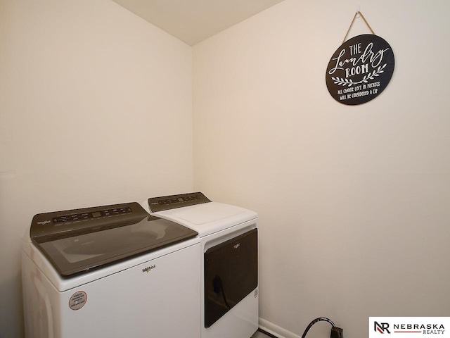 washroom with laundry area and washing machine and clothes dryer