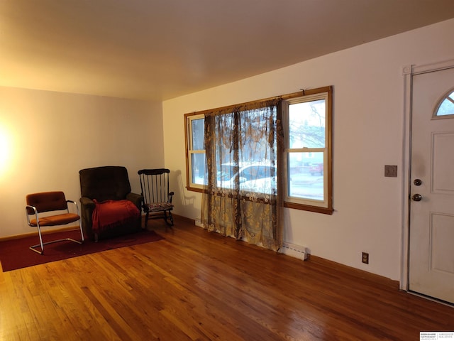 sitting room with wood finished floors