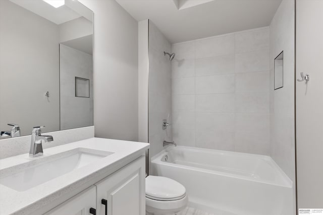 full bathroom with vanity, shower / tub combination, and toilet