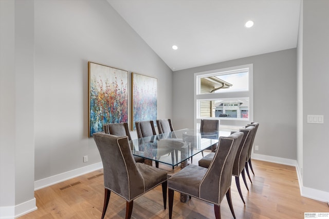 dining room featuring light wood finished floors, recessed lighting, visible vents, and baseboards