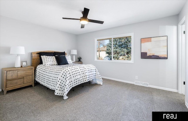 carpeted bedroom featuring visible vents, ceiling fan, and baseboards