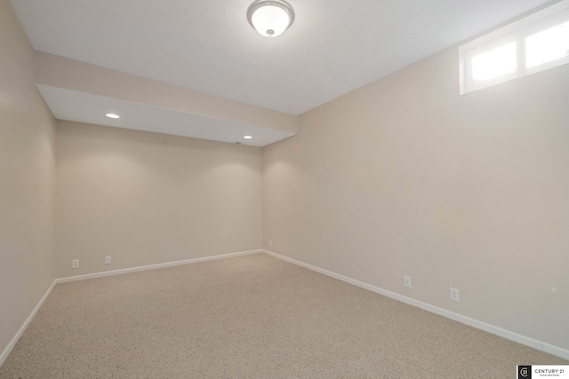 basement featuring recessed lighting, carpet flooring, and baseboards