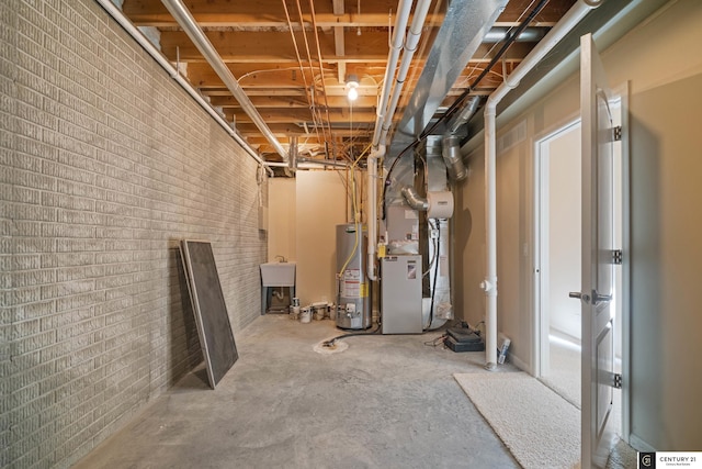 unfinished basement featuring gas water heater, brick wall, and heating unit