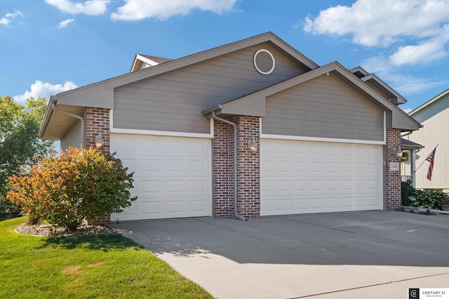 ranch-style house with a garage, concrete driveway, and brick siding