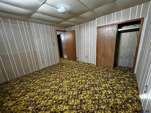 unfurnished room with a paneled ceiling