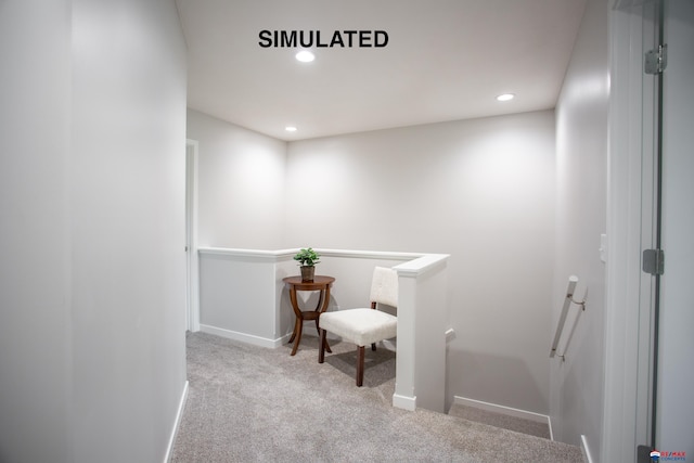 hallway with an upstairs landing, recessed lighting, carpet flooring, and baseboards