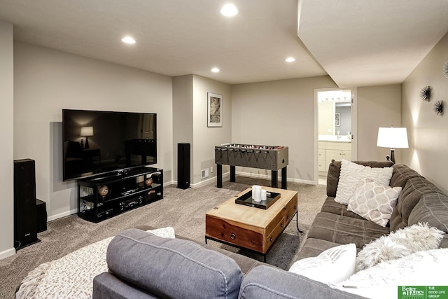 carpeted living room with baseboards and recessed lighting