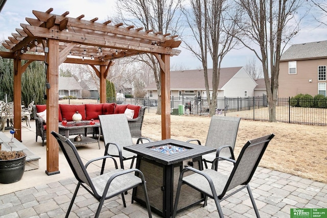 view of patio / terrace featuring a residential view, fence, a fire pit, and a pergola