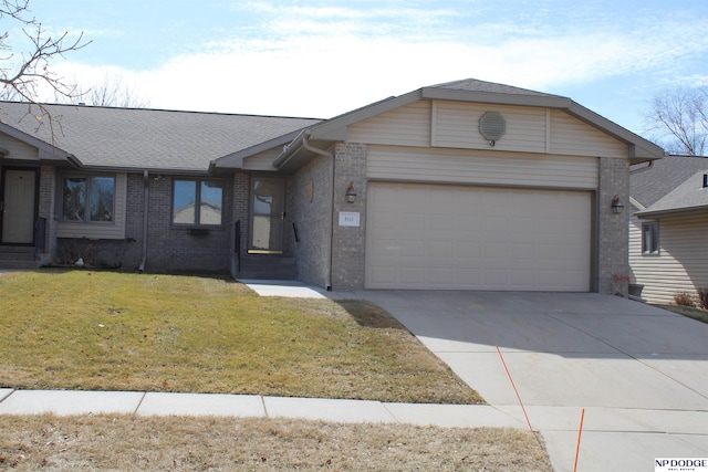 ranch-style home featuring driveway, roof with shingles, an attached garage, a front lawn, and brick siding