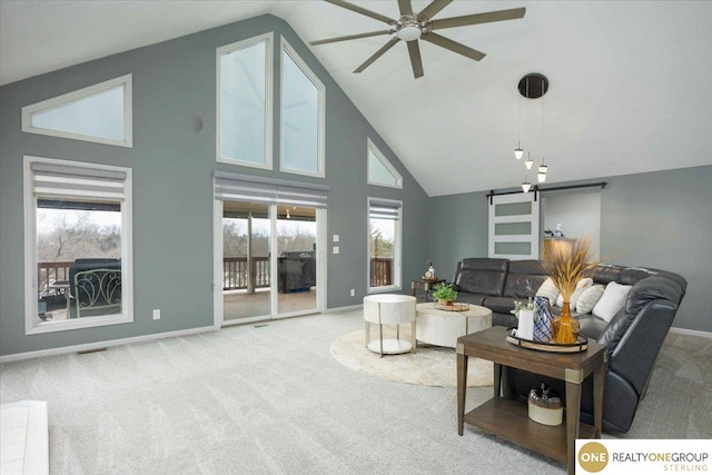 carpeted living area with high vaulted ceiling, baseboards, and ceiling fan