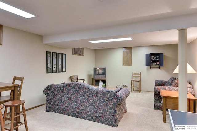 living area with carpet floors and baseboards