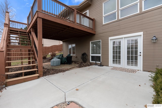 view of patio / terrace with stairway and a wooden deck