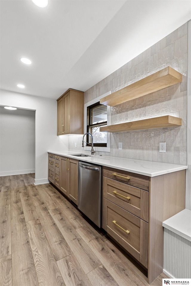 kitchen with decorative backsplash, dishwasher, light wood-style flooring, open shelves, and a sink