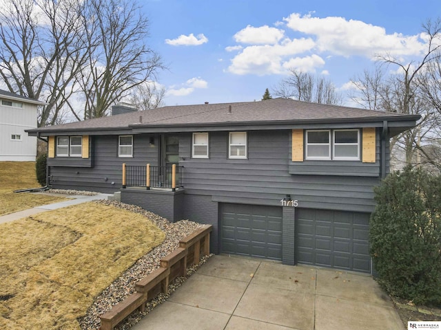 view of front of home featuring brick siding, a chimney, a shingled roof, concrete driveway, and a garage