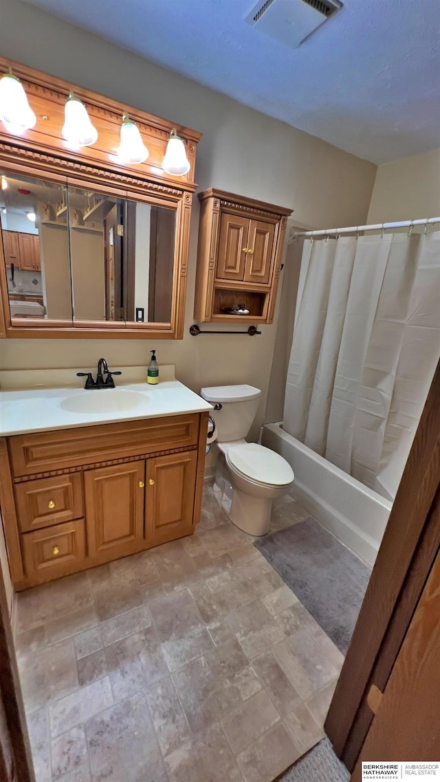 bathroom featuring toilet, shower / tub combo, vanity, and visible vents