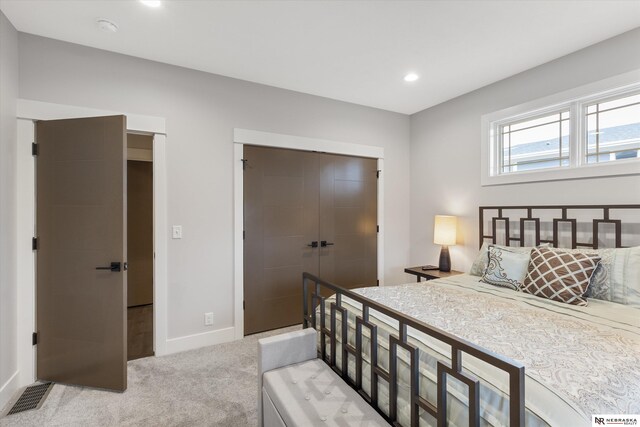 6919 Wildrye Rd, Lincoln, NE 68521 - carpeted bedroom with baseboards, visible vents, a closet, and recessed lighting