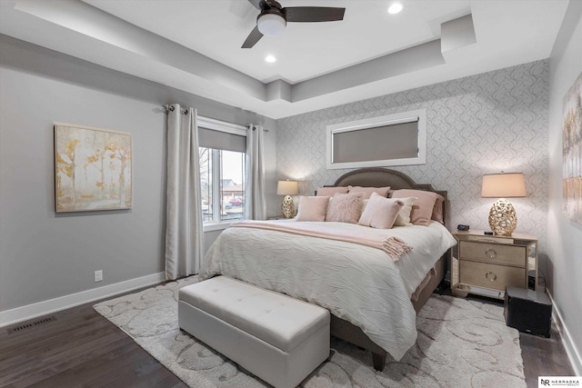 6919 Wildrye Rd, Lincoln, NE 68521 - bedroom with baseboards, a tray ceiling, visible vents, and wallpapered walls