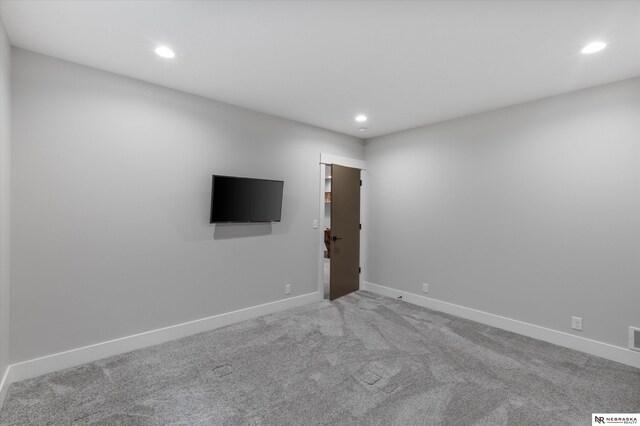 6919 Wildrye Rd, Lincoln, NE 68521 - spare room featuring baseboards, carpet, visible vents, and recessed lighting