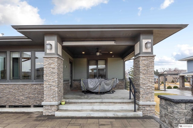6919 Wildrye Rd, Lincoln, NE 68521 - property entrance with covered porch and stone siding