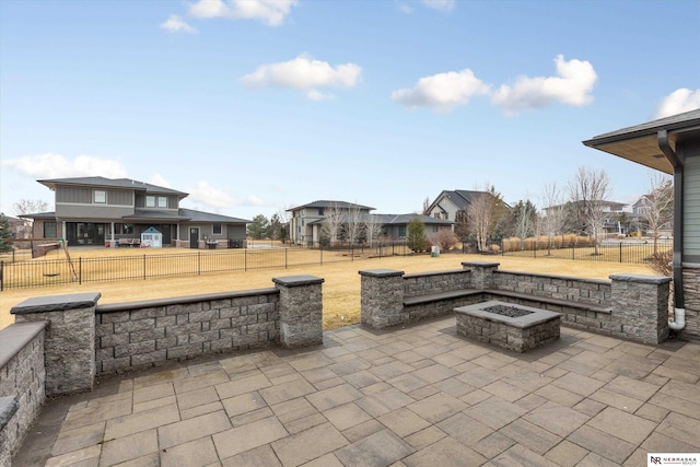 6919 Wildrye Rd, Lincoln, NE 68521 - view of patio featuring fence private yard and a fire pit