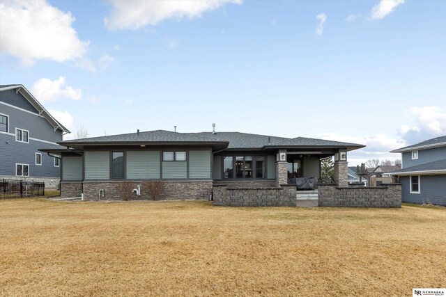 6919 Wildrye Rd, Lincoln, NE 68521 - back of house with a yard