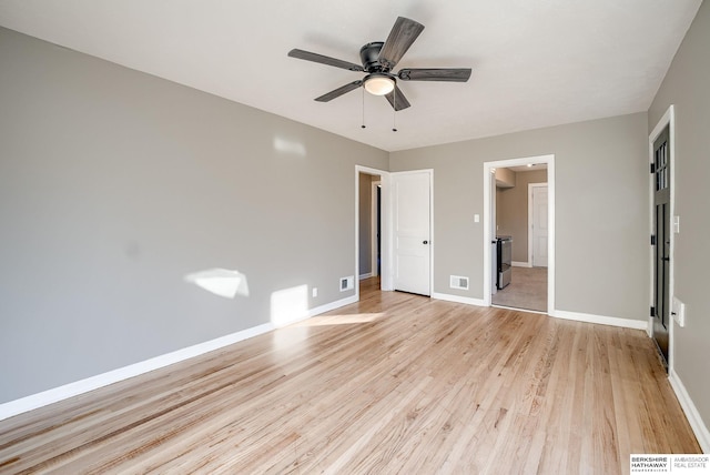 unfurnished bedroom featuring light wood-type flooring, visible vents, and baseboards