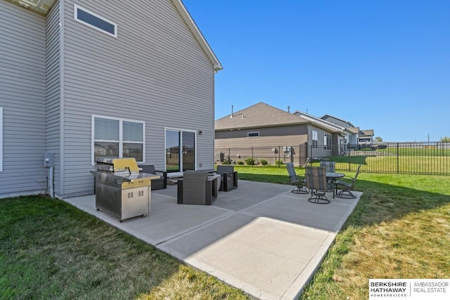 view of patio with fence and an outdoor living space