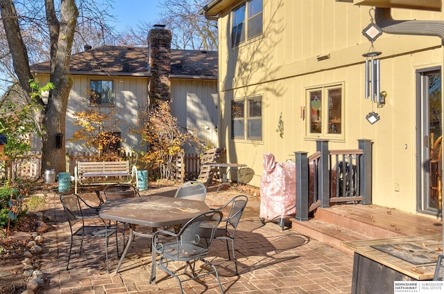 view of patio with outdoor dining area